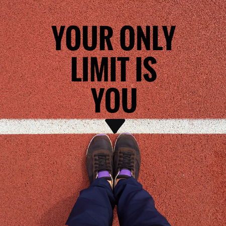 Inspirational quote "your only limit is you" on running track backgroundの写真素材