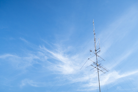 TV antenne with blue sky.の写真素材