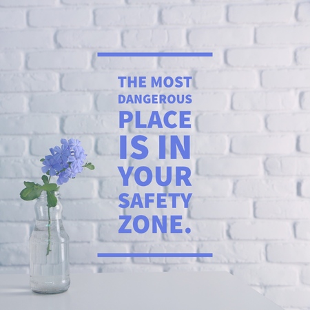 Inspirational Motivational quote "the most dangerous place is in your safety zone."の写真素材