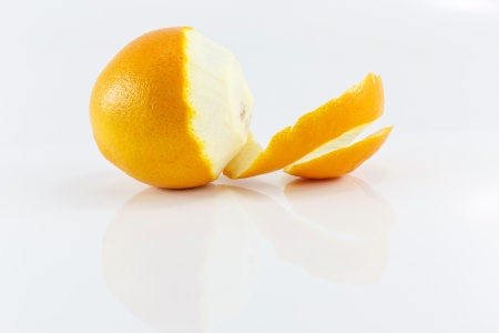Peeled lemon fruit isolated on white backgroundの写真素材