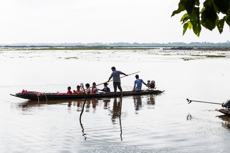 Children on boat are going to look lotus at Thalaynoi, Phathalung Province, South of Thailand