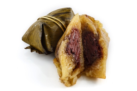 Thai dessert, Khao Tom Mad, steamed sticky rice with banana isolatedの写真素材