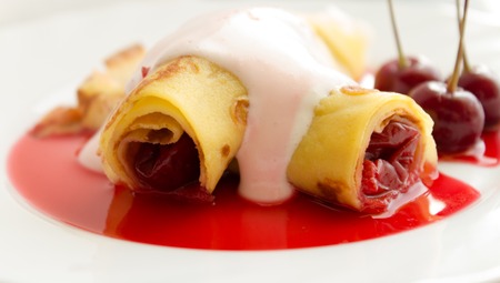 the crepe pancake with cherryの写真素材