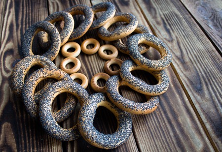 a bunch of bagels with poppy seedsの写真素材