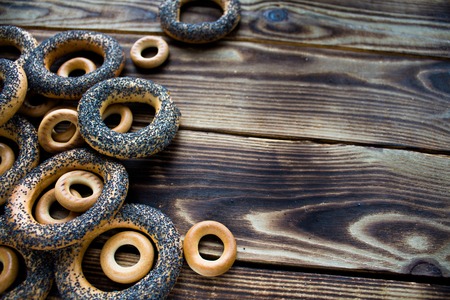 a bunch of bagels with poppy seedsの写真素材