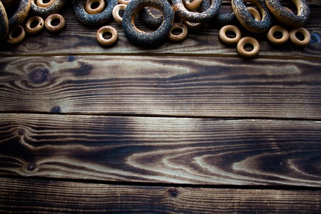 a bunch of bagels with poppy seedsの写真素材