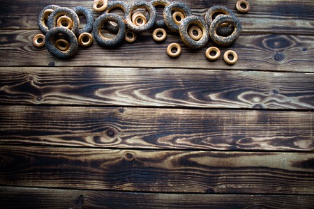 a bunch of bagels with poppy seedsの写真素材