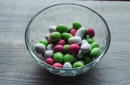 a bunch of bright candy in bowl