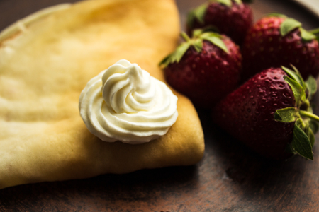 pancake crepe with strawberry and whipped creamの写真素材