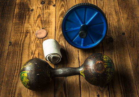 sports equipment retro on a wooden bacgroundの写真素材