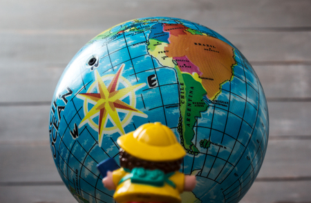 a toy on the background of the Earth
