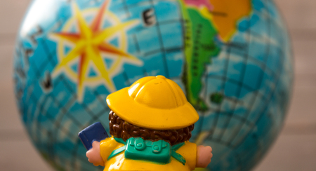 a toy on the background of the Earthの写真素材