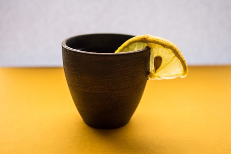 alcoholic drink with lemon on white backgroundの写真素材