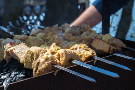 a kebab on the grill in the open airの写真素材