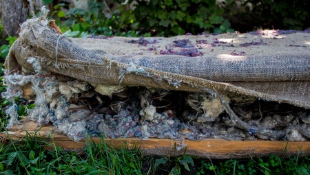 old sofa with a springの写真素材