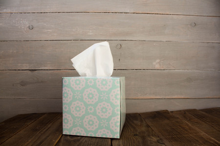 box with napkins on wooden backgroundの写真素材