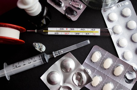 different medicines for treatment on black backgroundの写真素材