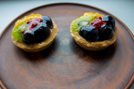 a tasty cakes with fresh fruits and berries on a plate