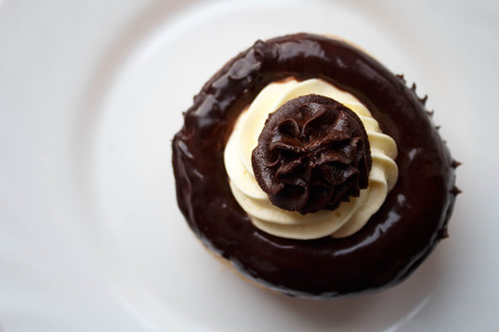 a delicious rum cake with chocolate and butter creamの写真素材