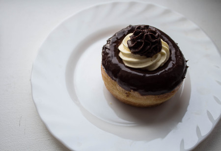 a delicious rum cake with chocolate and butter creamの写真素材