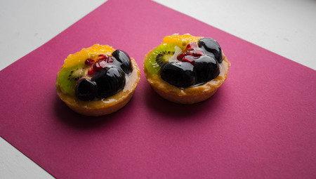 a tasty cake with fresh fruits and berriesの写真素材