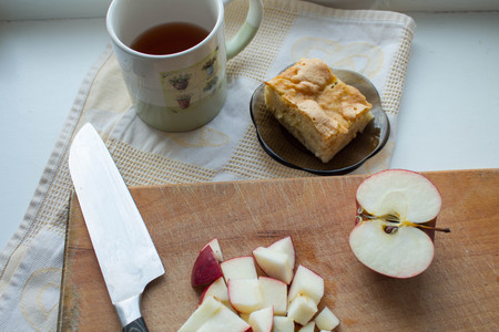 apple pie knife and tea on a white backgroundの写真素材
