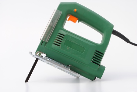 green hacksaw isolated in white backgroundの写真素材