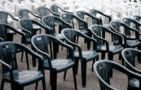 rows of plastic chair ready for a showの写真素材