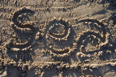 Write sea on the sand at the beachの写真素材