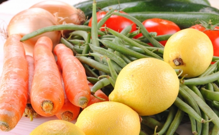 fresh organic vegetables on a wooden tableの写真素材