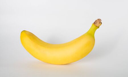 one banana on a white backgroundの写真素材