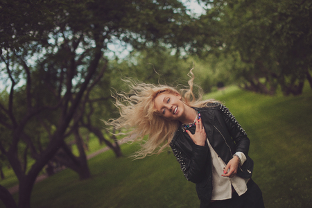the blonde flutters her beautiful hair.の写真素材