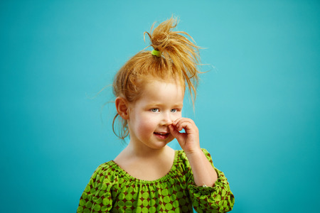 Image Of Little Red Haired Funny Girl Picks His Nose
