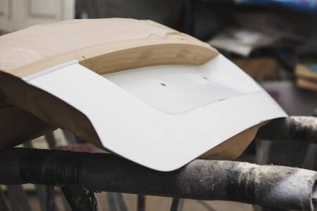 Preparation for painting the trunk of the car. Service workshop for body repair. Restoration of...