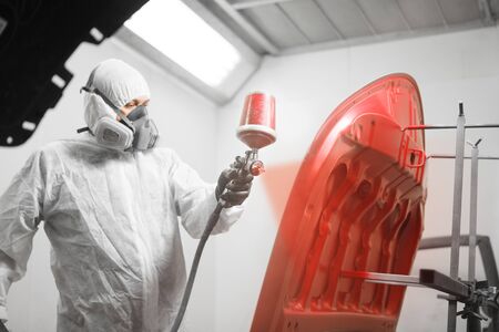 Application of first layer spray painting of the car hood.の写真素材