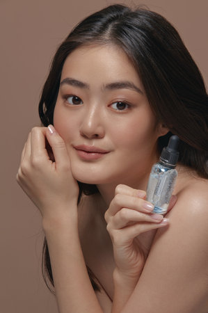 Vertical close up portrait, beautiful korean ethnicity woman with a healthy clean and perfectly...