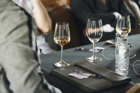 Sommelier school. Professional wine waiters are trained, close up. Winemaking courses, wine tasting.の写真素材