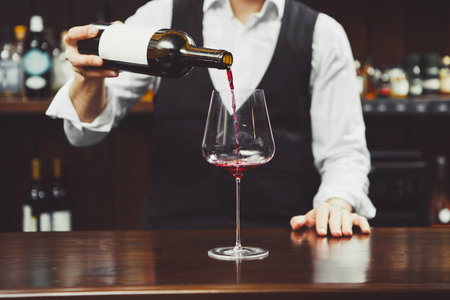 Man Pouring Red Wine, Close-upの写真素材