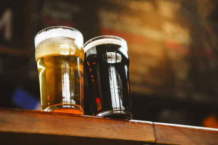 Cheers With Two Glasses of Beer on Rustic Wooden Table in Lively Bar Setting