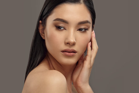 Closeup portrait of young woman with healthy skin.の写真素材