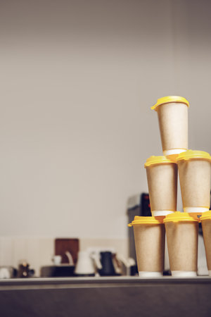 Stack of Coffee Cups on Counterの写真素材