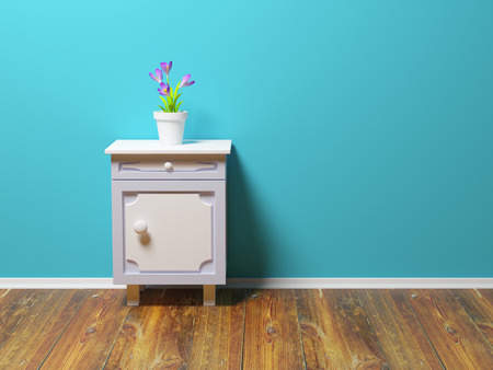 classic nightstand with flower at the wallの写真素材
