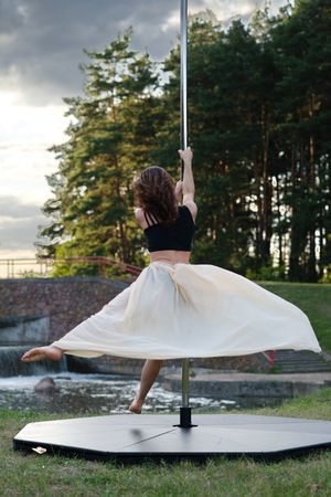 Young sexy pole dance womanの写真素材