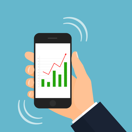Hand holding smartphone with stock market bar graph alert illustrationの写真素材