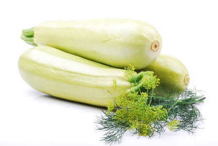 Zucchini, whole, garlic, dill, isolated on a white backgroundの写真素材