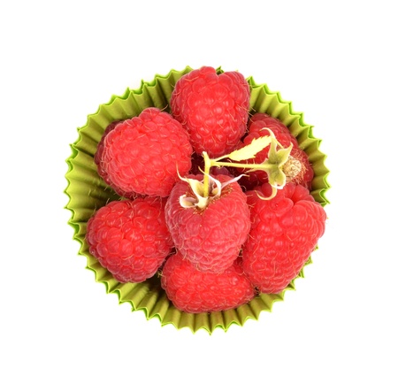 fresh berries in paper form on white backgroundの写真素材