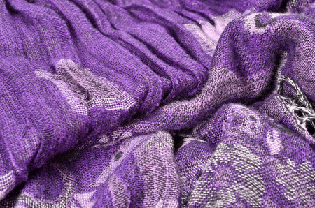 high detail background and cloth textures purple scarf  as abstract background