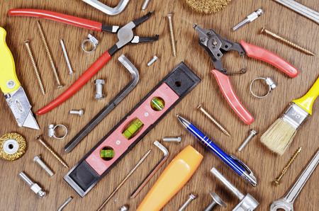 set of tools and instruments on wooden background