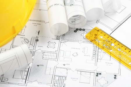 Architectural project and yellow helmetの写真素材