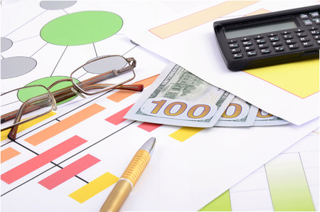 Business still life with pen, glasses and calculator,  diagramの写真素材